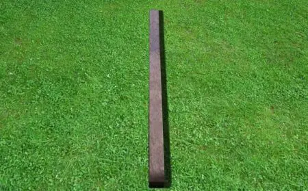 8 Ft Recycled Plastic Post laying on ground to show length