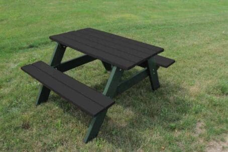 A Economizer 4 foot space saver picnic table made out of recycled plastic. Shown with a green frame and black top and seat boards.