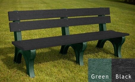The Economizer Traditional 6' commercial outdoor park bench made of 100% recycled HDPE plastic. This bench has the same design as our Traditional 6' bench, but made with smaller, lighter 1 1/4"x5" planks. Shown on grass with a green frame and black boards.