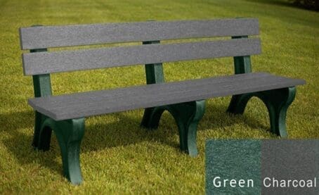 The Economizer Traditional 6' commercial outdoor bench made of 100% recycled plastic. This bench has the same design as our Traditional 6' bench, but made with smaller, lighter 1 1/4"x5" planks. Shown on grass with a green frame and charcoal boards.
