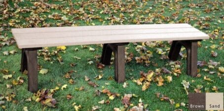 The Economizer Traditional 6 foot flat bench is made from 100% recycled HDPE plastic. This bench has the same design as our Traditional flat bench but uses our lighter weight 1 1/4"x5" planks instead of the standard 2"x6" planks. The bench is shown on grass with a brown frame and sand seat boards.