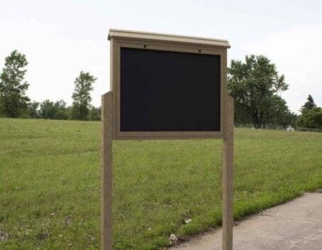 Weathered Wood Large Message Center 2 Sideed with 2 posts anchored to public park sidewalk ready to display info