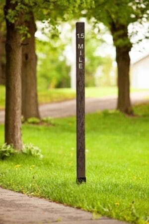 Brown Engraved Mile Marker for trail navigation, recycled plastic