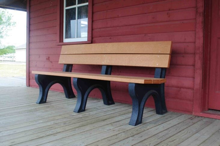 Traditional 6ft bench at public farmers market red mill